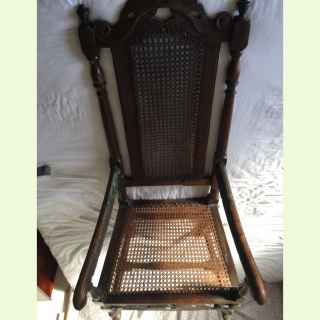 English Charles II caned armchair.