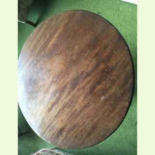 Antique George III mahogany circular tilt-top tripod table.