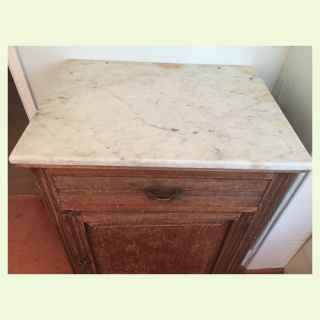 Antique pine bathroom cabinet with carrara marble top.